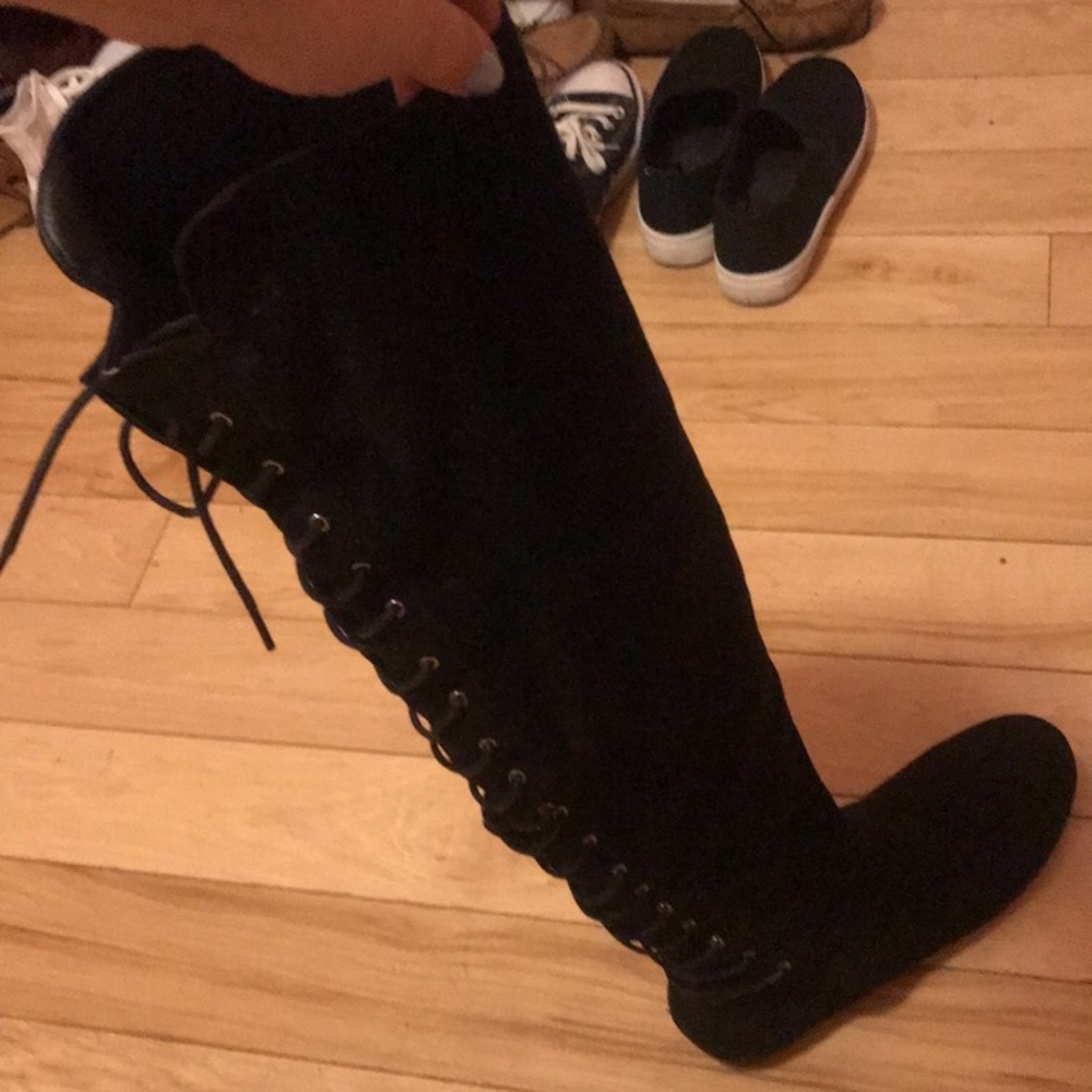 Thigh high black boots